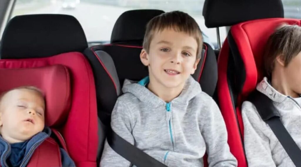 When can a child sit in the front seat in Texas