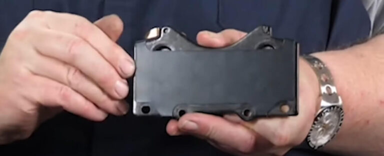 does the brake pad with the clip go on the inside or outside